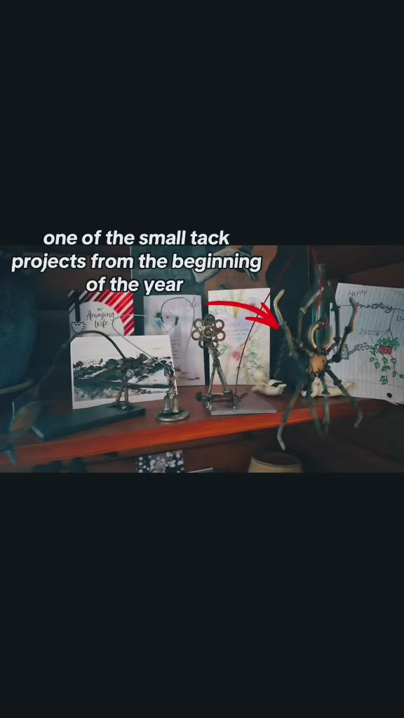 Hand made welded swinging spider